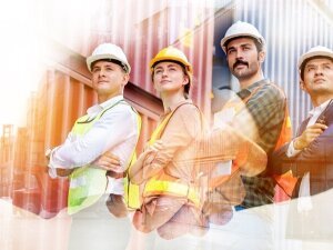 Team Construction or engineering group and worker. Teamwork and determination to succeed. Safety hard hat to prevent accident while working Transport and Container Team. Concept Restart and new Normal