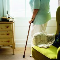 Senior woman standing alone in the room